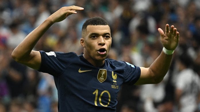 France's Kylian Mbappe celebrates scoring their third goal to complete his hat-trick at Lusail Stadium in Qatar on 18 December 2022 | Photo: Reuters/Dylan Martinez