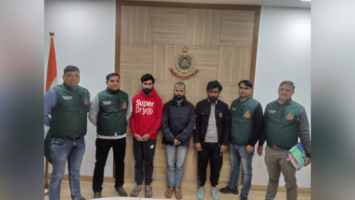 By special arrangement | The four accused with IFSO officers