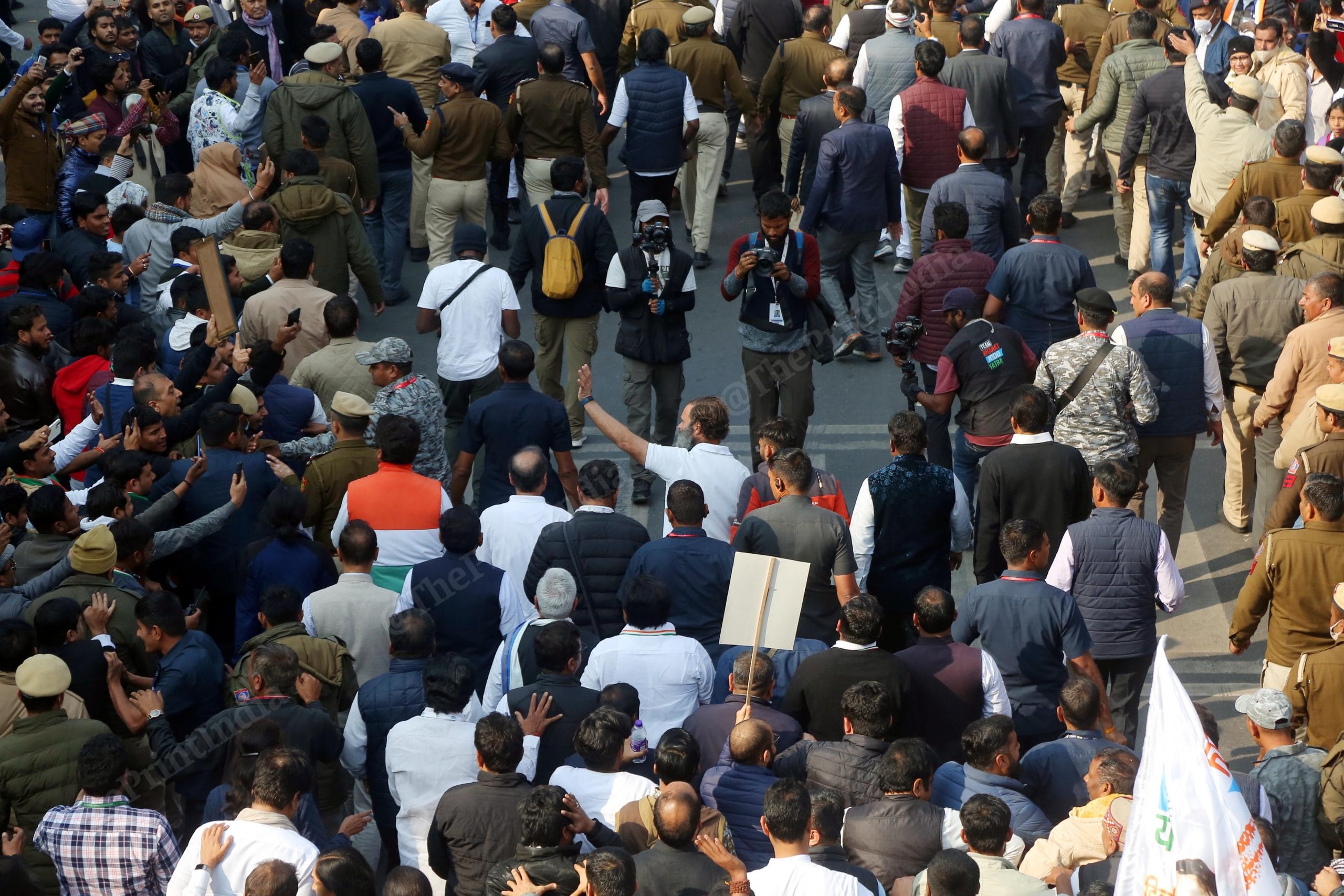 Congress Leader Rahul Gandhi waves to the masses during Bharat Jodo Yatra's New Delhi leg Saturday | Photo: Suraj Singh Bisht | ThePrint