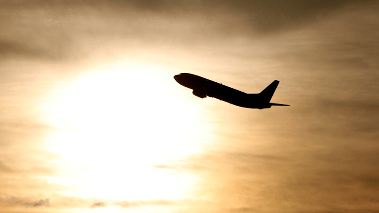 EU strikes deal on law to make polluting airlines pay more, phase out free permits