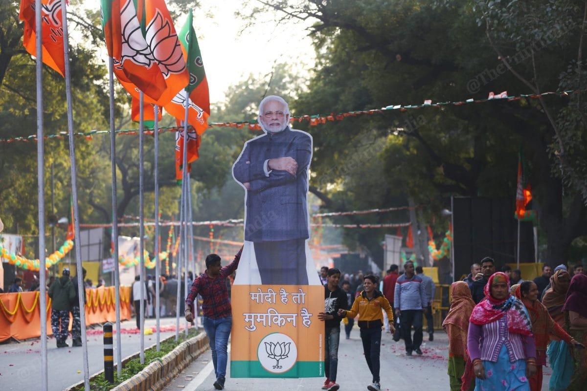 Some children carry Modi cut outs | Photo: Manisha Mondal | ThePrint