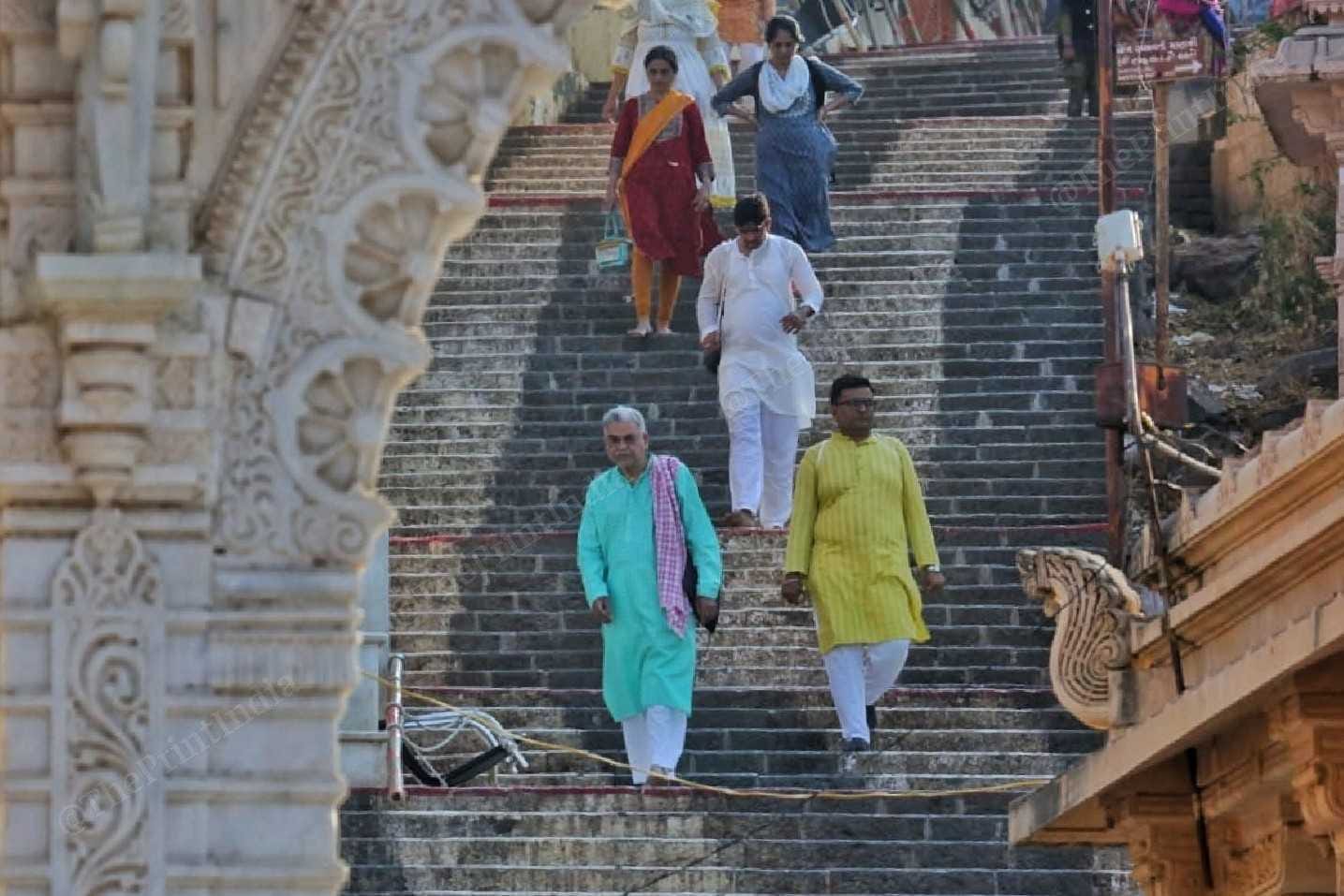 Pilgrims return after paying obeisance at a temple | Praveen Jain | ThePrint