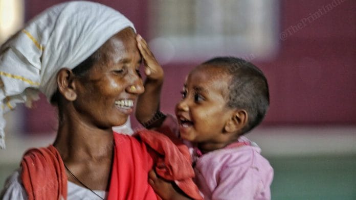 A mother and child enjoy a light moment inside the stadium-camp in Narayanpur | Photo: Praveen Jain | ThePrint