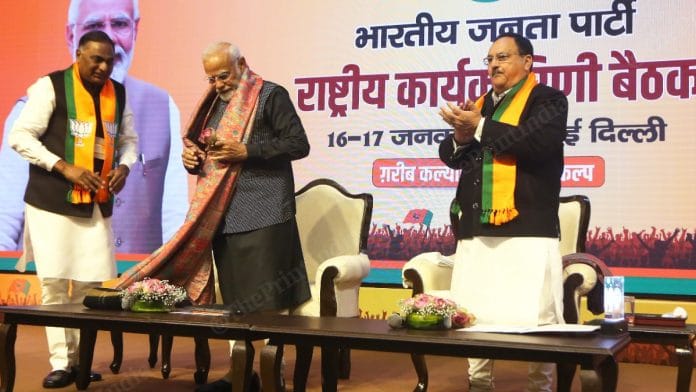 PM Narendra Modi with BJP chief JP Nadda at national executive meeting in New Delhi on Monday | Praveen Jain | ThePrint