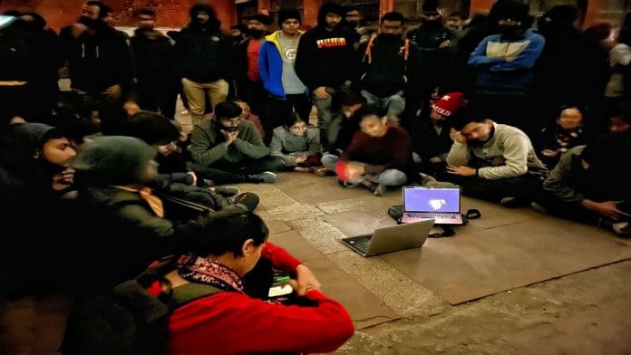 JNU students outside the community centre Tuesday evening. | Manisha Mondal | ThePrint