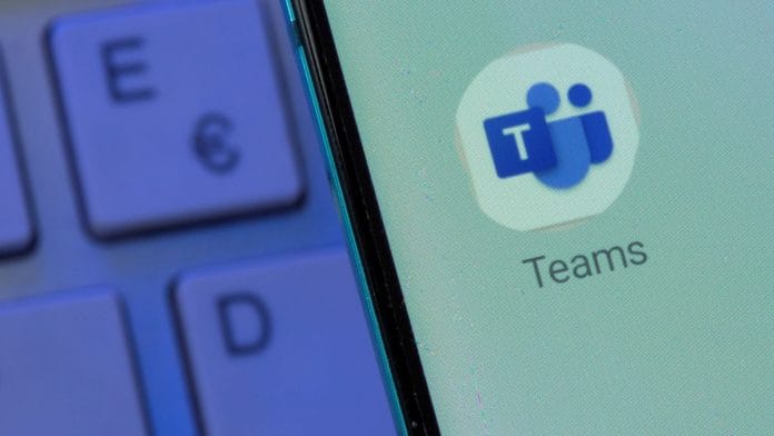 Microsoft Teams app is seen on the smartphone placed on the keyboard in this illustration | Reuters