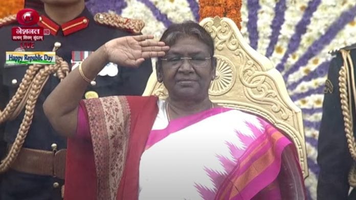 President Droupadi Murmu gives salute to the marching contingents on Republic Day in New Delhi