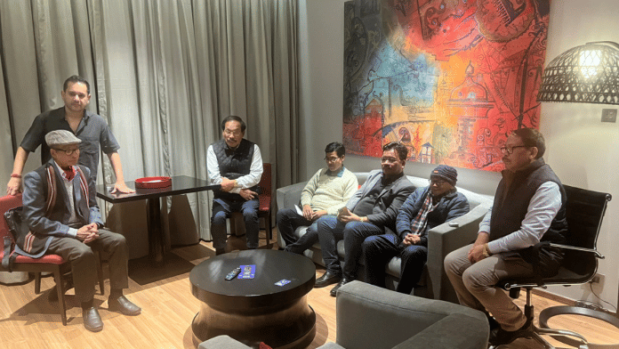 TIPRA Motha chief Pradyot Debbarma (standing) with leaders of IPFT | Twitter | @PradyotManikya