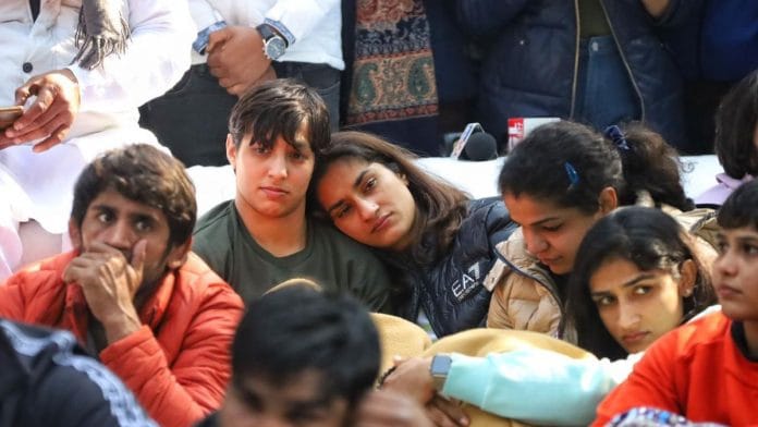Wrestlers Bajrang Punia, Vinesh Phogat, Sakshi Malik and others at the protest site in Jantar Mantar, Delhi | ThePrint photo | Manisha Mondal
