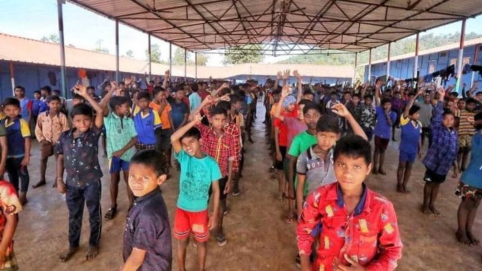 Students at the assembly hall of the Orchha Porta Cabin school | Praveen Jain | ThePrint