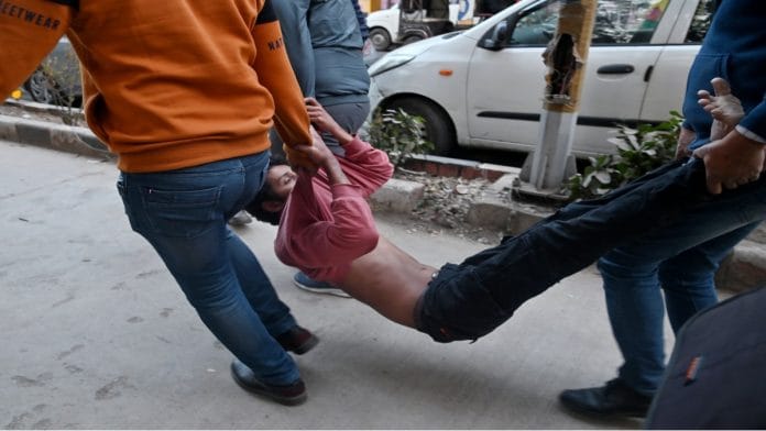 Students protest as security guards stop the screening of 'India: The Modi Question', at the Faculty of Arts, Delhi University, in New Delhi Friday. | ANI