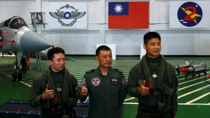 Lieutenant Colonel Wu Bong-yeng poses for a photo at an airbase in Hsinchu, Taiwan, on 11 January 2023 | Reuters