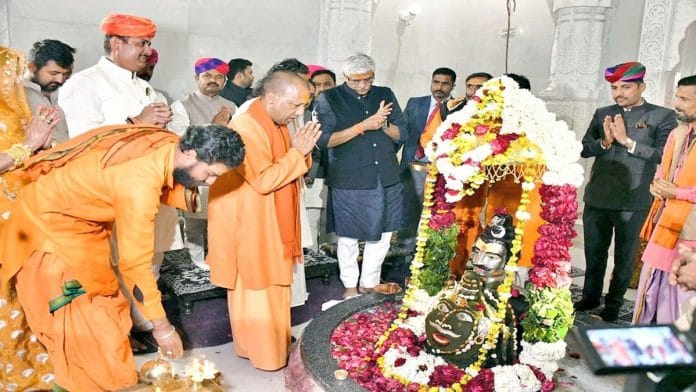 UP CM Yogi Adityanath with Union minister Gajendra Singh Shekhawat at the Rajasthan's Neelkanth Mahadev Mandir mahotsav Friday. | Twitter: @gssjodhpur