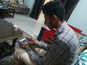 Vipul watching his Byjus sessions on his mother's phone.