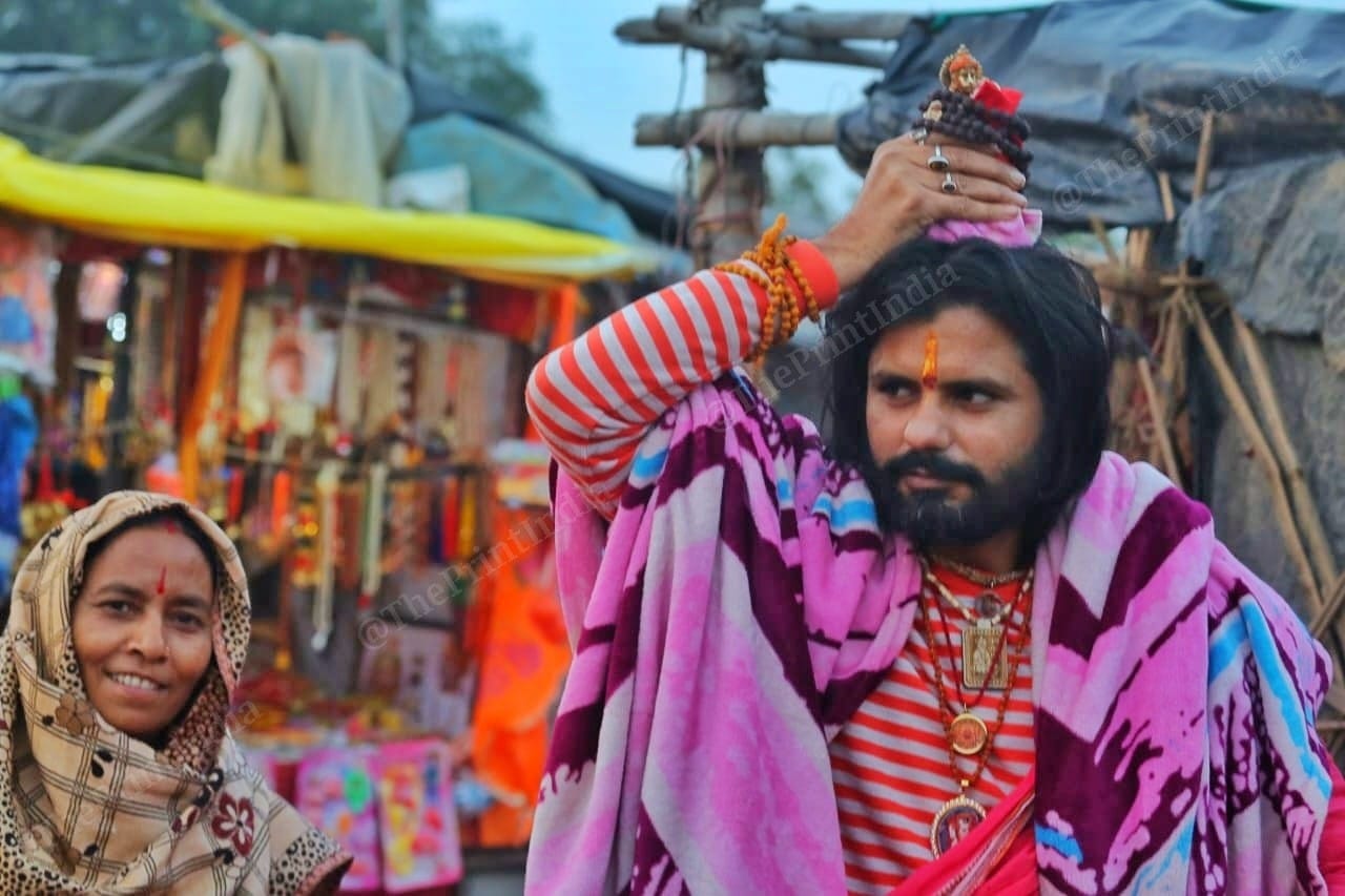 A devotee carries god Hanuman's idol to the temple | Photo: Praveen Jain | ThePrint