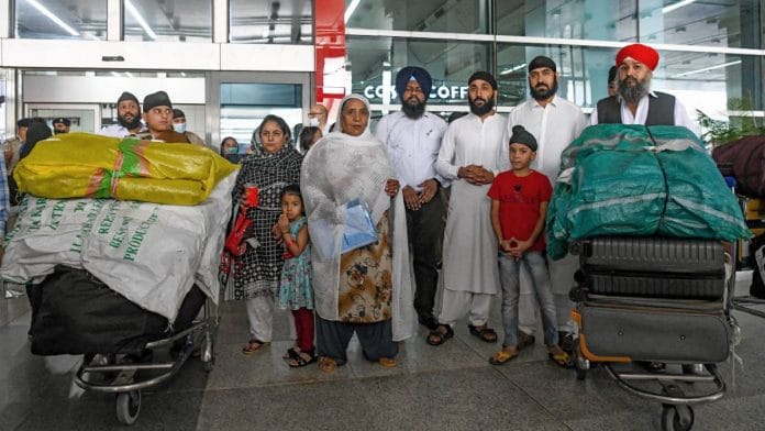 File photo of Afghan Sikhs arriving at Delhi's Indira Gandhi International Airport from Kabul | ANI