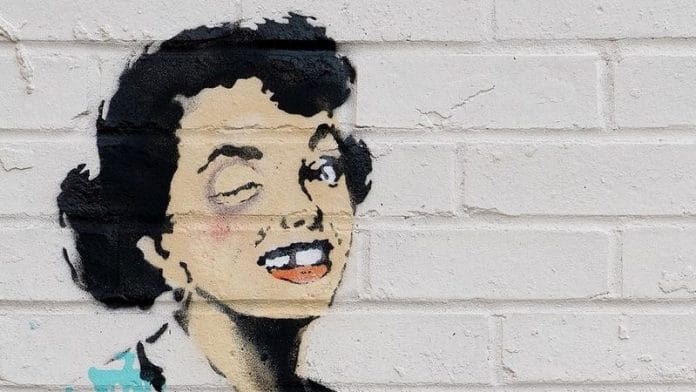 An artwork depicting violence against women, painted by street artist Banksy for the occasion of Valentines Day, is seen on a wall in Margate, Kent, Britain on 14 February, 2023 in this picture obtained from social media | Reuters