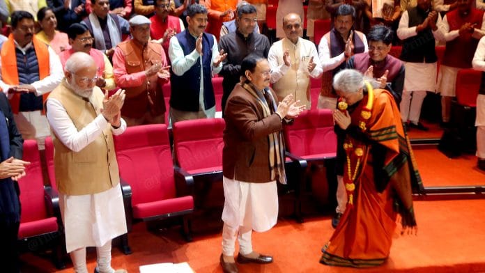 Union Finance minister Nirmala Sitharaman being felicitated at BJP parliamentary party meet | Praveen Jain | ThePrint