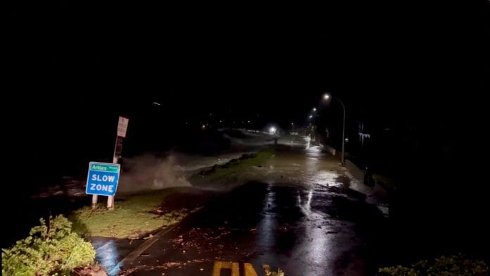 A view shows high tides rising due to Cyclone Gabrielle in Arkles Bay, Auckland | John Longson/Twitter @JohnLongson/via Reuters