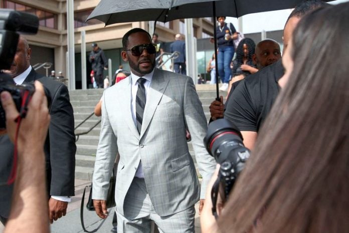 Kenneth Kelly Singe R Singer R. Kelly sentenced to one year on federal child pornography ...