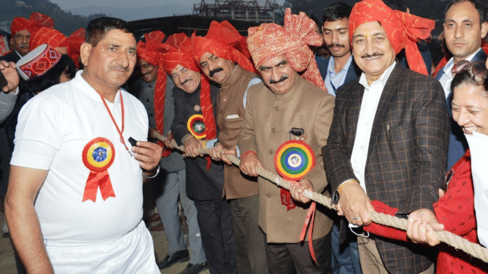 Himachal Pradesh CM Sukhvinder Singh Sukhu (wearing light colour turban) participates in a ritual at International Mandi Shivratri fair | Twitter | @CMOFFICEHP