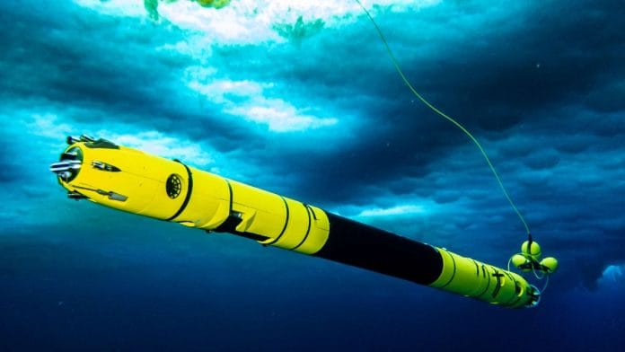 An Icefin is seen in the water as scientists work in the field at the Thwaites Glacier in Antarctica in this undated handout picture obtained by Reuters on 14 February, 2023 | Reuters