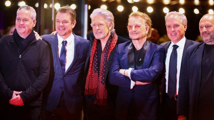 Producer Matt Damon, Adam Clayton and Bono of U2, screenwriter Bill S. Carter and Mirsad Purivatra attend the screening of the documentary movie 'Kiss the Future' at the 73rd Berlinale International Film Festival in Berlin, Germany, on 19 February, 2023 | Reuters