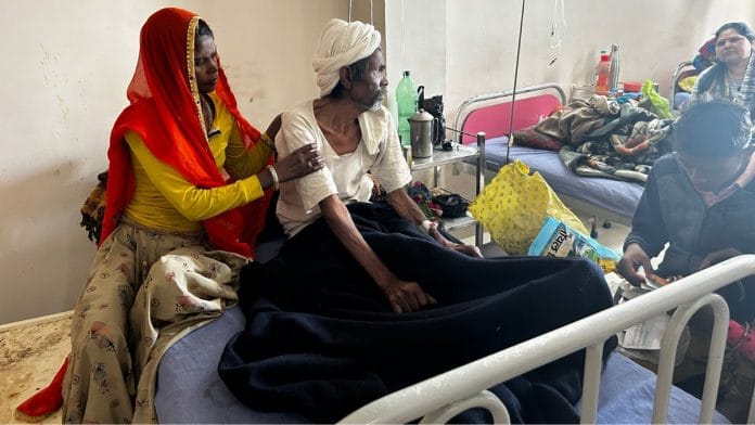 Surja with her ailing father, Kalu Ram, at Tonk's Aggrawal Hospital | Jyoti Yadav | ThePrint
