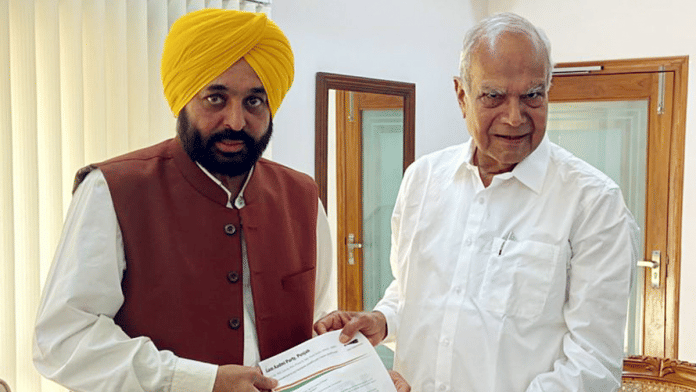 File photo of Punjab Chief Minister Bhagwant Mann with Governor Banwarilal Purohit | ANI