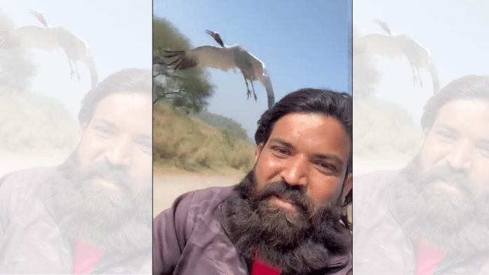 Screenshot of a video of Arif and the Sarus crane | Twitter/@gyanu999