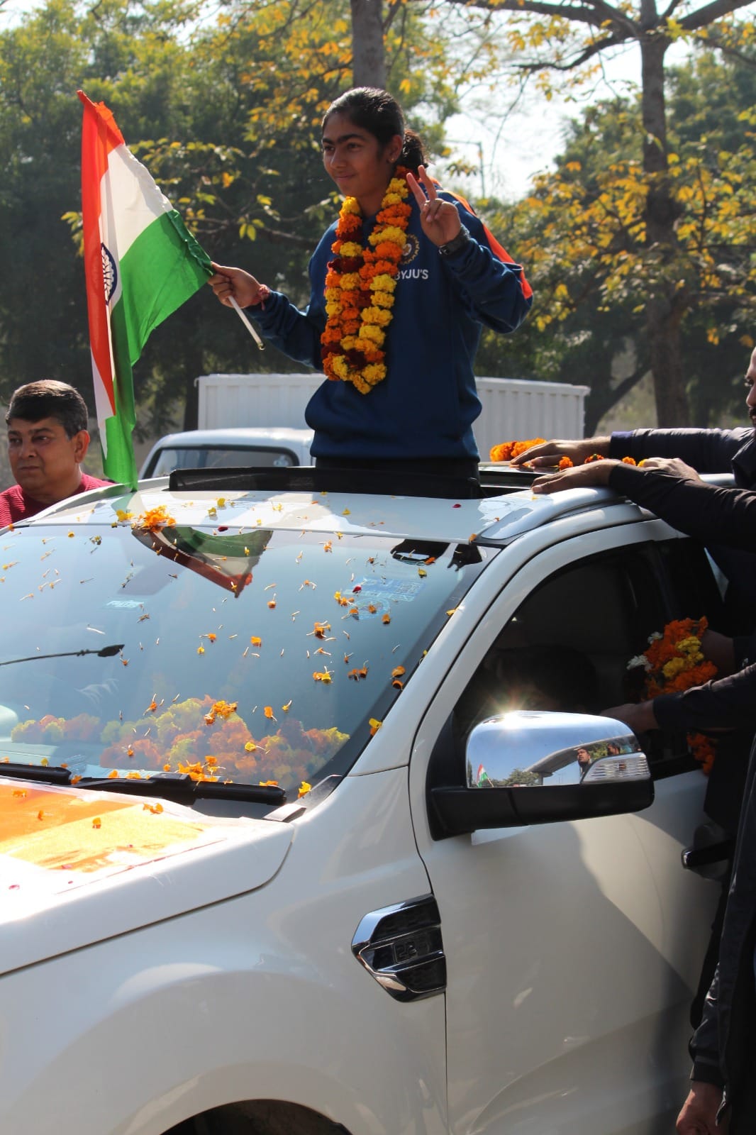 Parshavi received a warm welcome from her family, neighbours, and fans outside her Greater Noida society on 2 February | Image by special arrangement