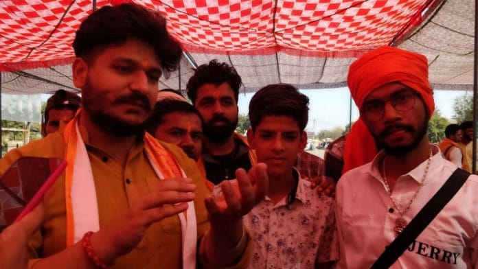 Young men at the Hindu mahapanchayat in Bhiwani | Credit: Disha Verma | ThePrint