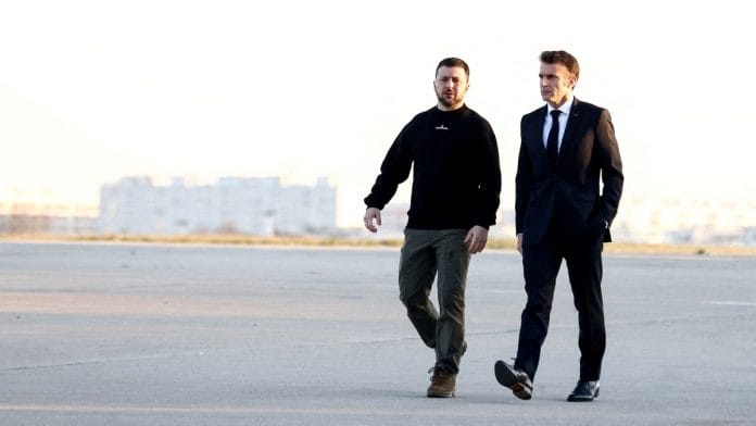 French President Emmanuel Macron and Ukrainian President Volodymyr Zelenskiy leave for a summit in Brussels, on 9 February 2023 | Reuters