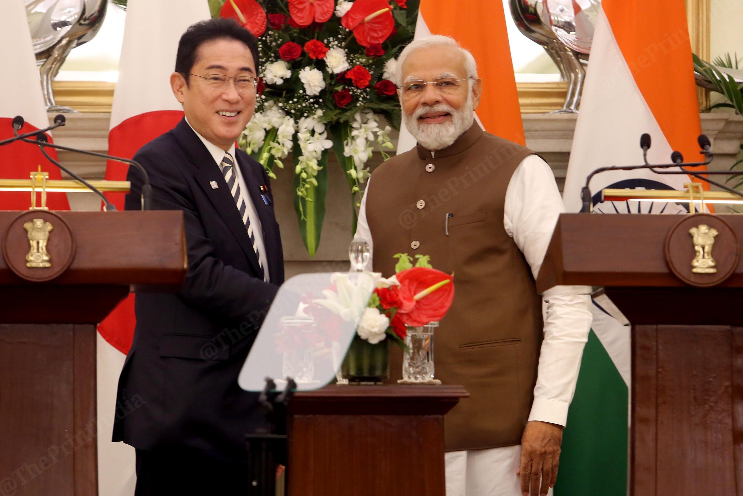 Modi and Kishida shake hands after the joint media briefing at Hyderabad House | Photo: Praveen Jain | ThePrint