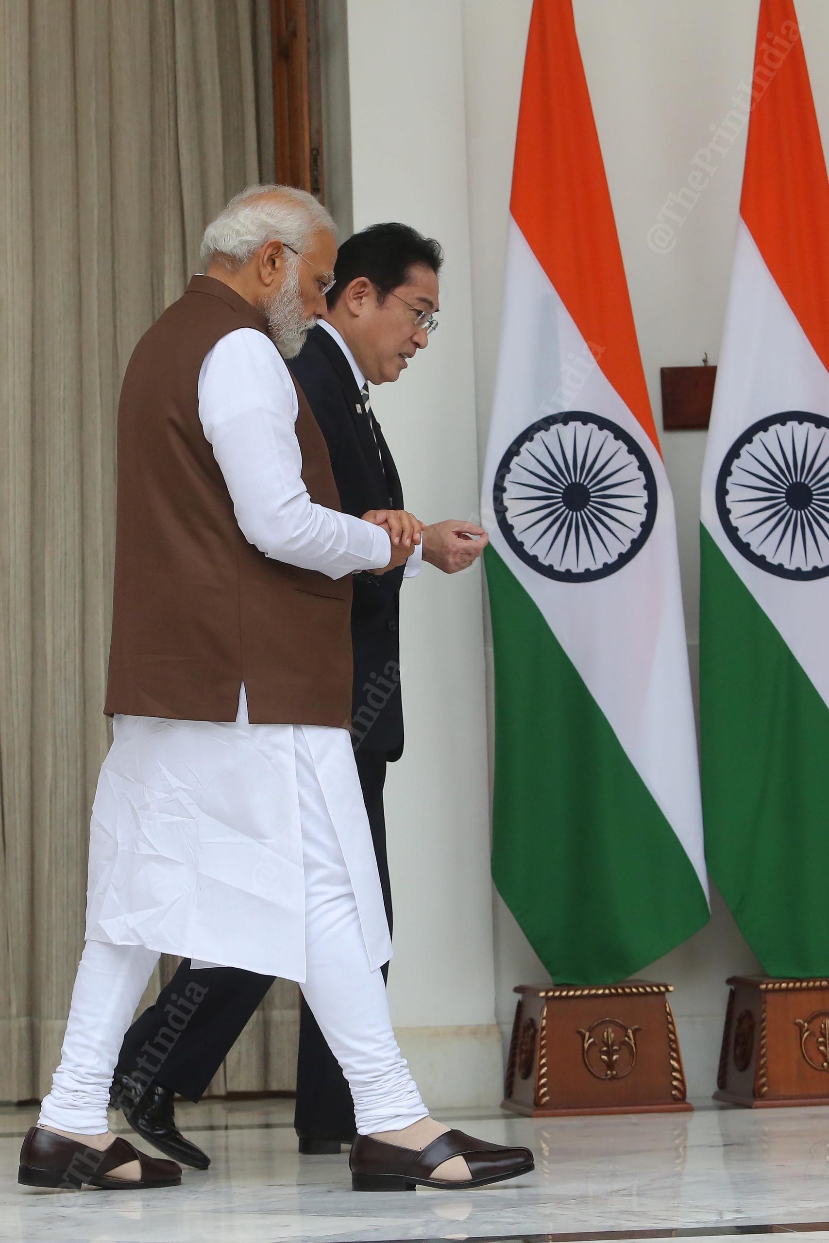Japanese Prime Minister Fumio Kishida in conversation with Indian PM Narendra Modi ahead of their meeting at Delhi's Hyderabad House Monday | Photo: Praveen Jain | ThePrint