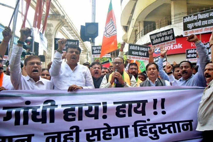 Maharashtra BJP president Chandrashekhar Bawankule stages a protest along with party supporters against Congress leader Rahul Gandhi over his remark, at lalbaug in Mumbai, Saturday | ANI