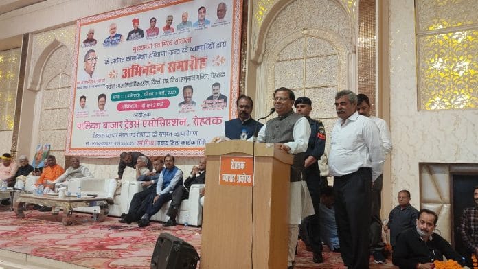 Haryana minister Kamal Gupta addressing BJP Vyapar Prakoshth meet in Rohtak Sunday | Twitter @drkamalguptabjp