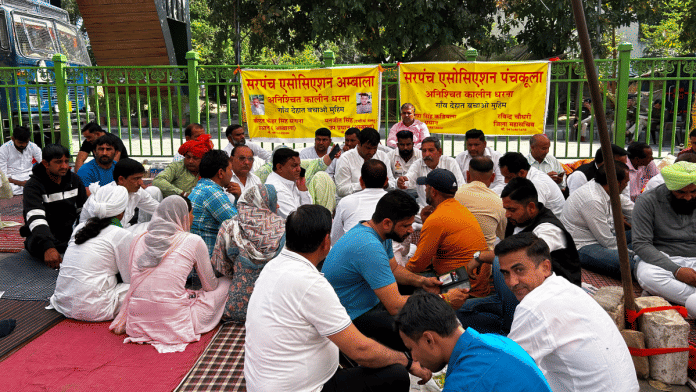 Gaanv dehat bachao or 'Save the village' banner at the Panchkula protest | Jyoti Yadav