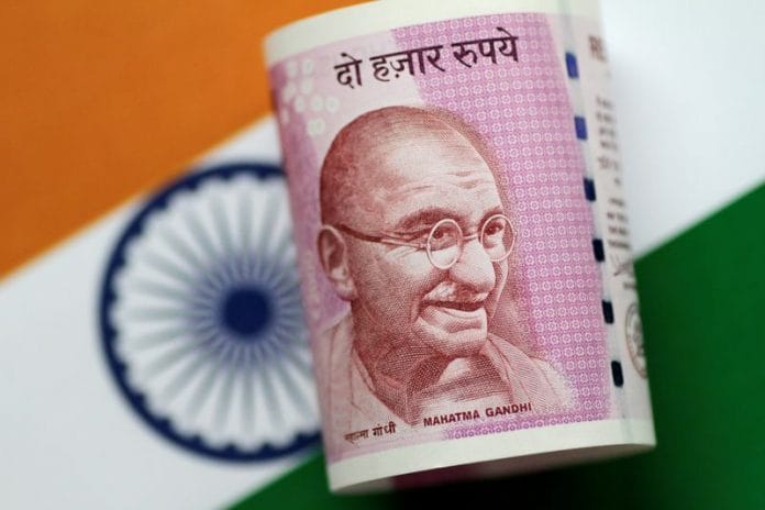 An Indian Rupee note is seen in this illustration photo | Reuters