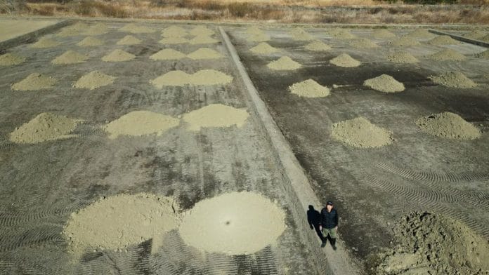 A field where contaminated soil from the fallout of the Fukushima nuclear plant was kept and which is now in the works to be converted back to a rice field in Namie, about 7 km from the crippled Fukushima Dai-Ichi nuclear plant, Fukushima Prefecture, Japan on 28 February, 2023 | Reuters