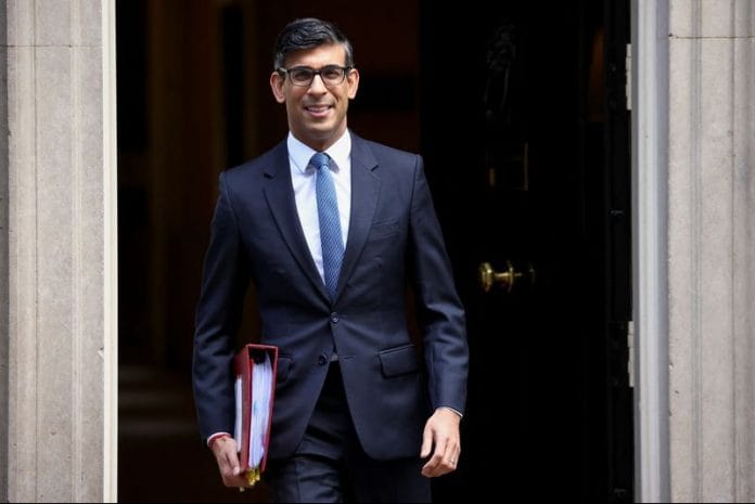 British Prime Minister Rishi Sunak walks on Downing Street in London | File Photo: Reuters
