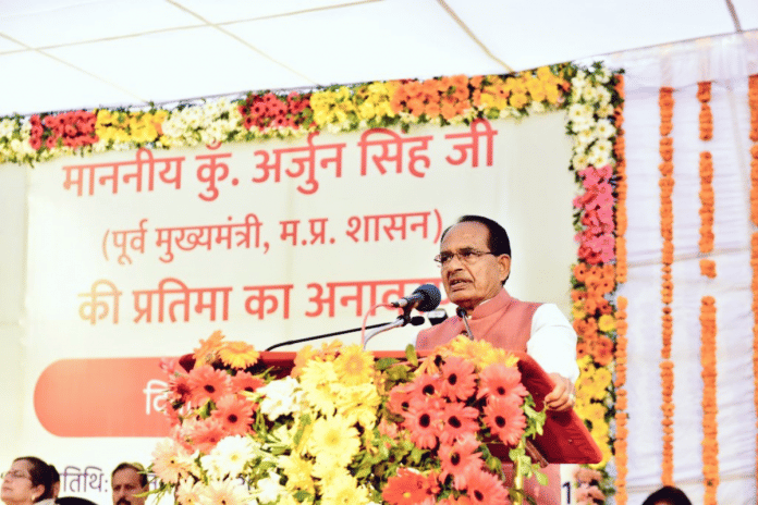 Madhya Pradesh CM Shivraj Singh Chouhan speaks after unveiling a statue of Congress leader Arjun Singh in Bhopal | Twitter | @ChouhanShivraj