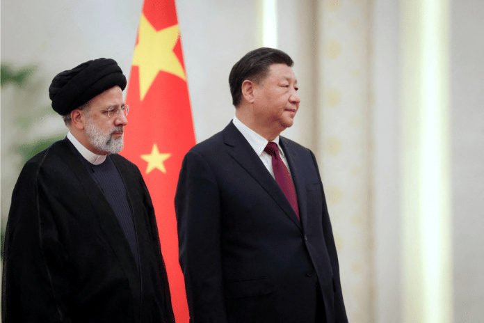 ranian President Ebrahim Raisi stands next to Chinese President Xi Jinping during a welcoming ceremony in Beijing, China, 14 Febraury, 2023. Iran's President Website/WANA (West Asia News Agency)/Handout via Reuters