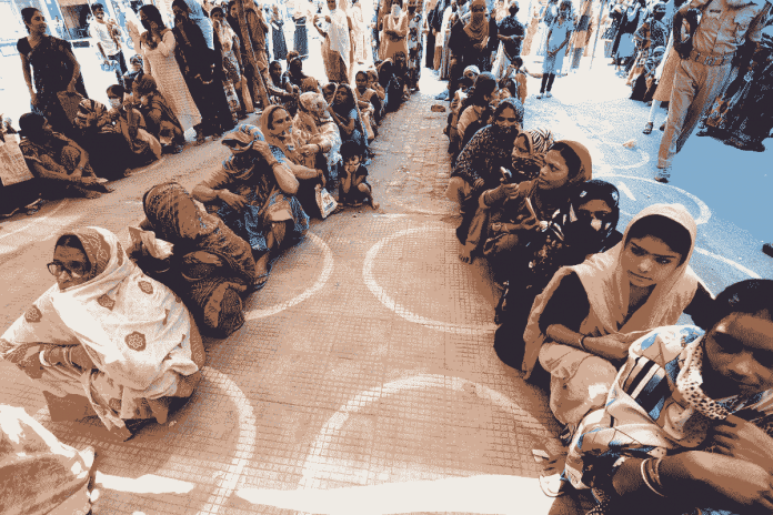 File photo of women waiting in queue to access Jan Dhan accounts in Patna | ANI