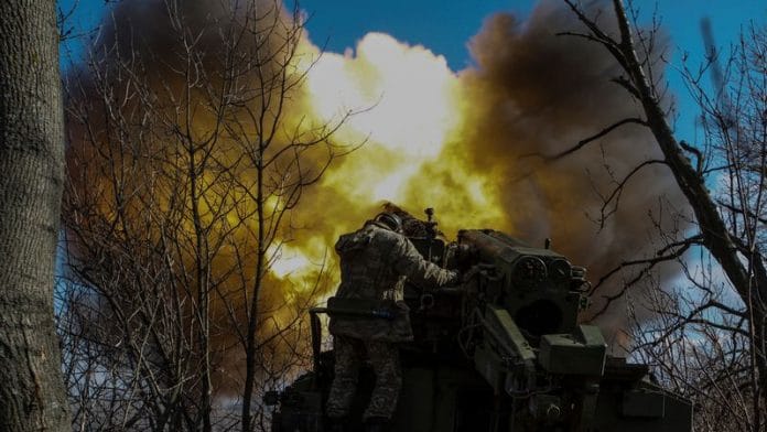 Ukrainian servicemen fire a 2S5 Giatsint-S self-propelled howitzer towards Russian troops outside the frontline town of Bakhmut, amid Russia's attack on Ukraine, in Donetsk region, Ukraine on 5 March, 2023 | Reuters