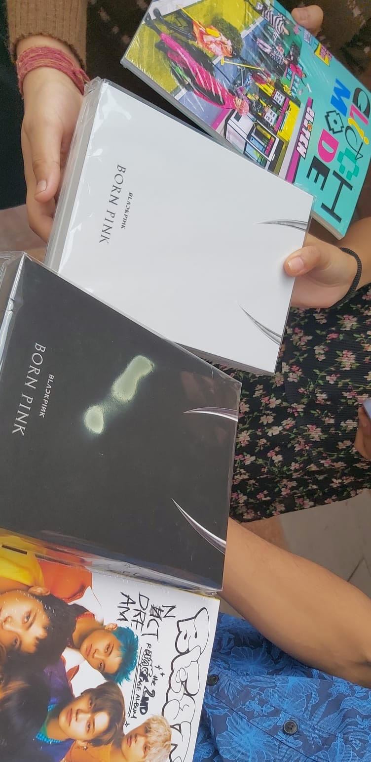 Lucky winners with copies of K-pop albums distributed by KCCI | Photo by special arrangement