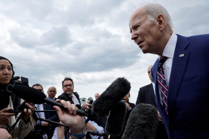 U.S. President Joe Biden speaks with reporters before boarding Air Force One to return to Washington from Raleigh-Durham International Airport, Morrisville, North Carolina, U.S., March 28, 2023. REUTERS/Jonathan Ernst