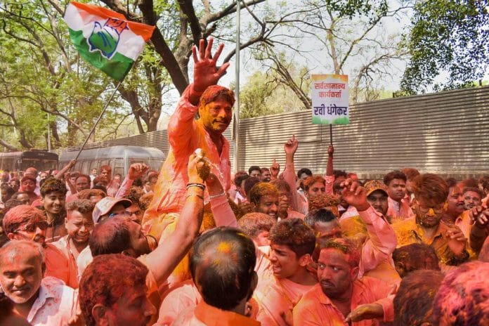 Congress candidate Ravindra Dhangekar celebrates his victory in the Kasba Peth assembly bypoll, in Pune Thursday | Credit: PTI