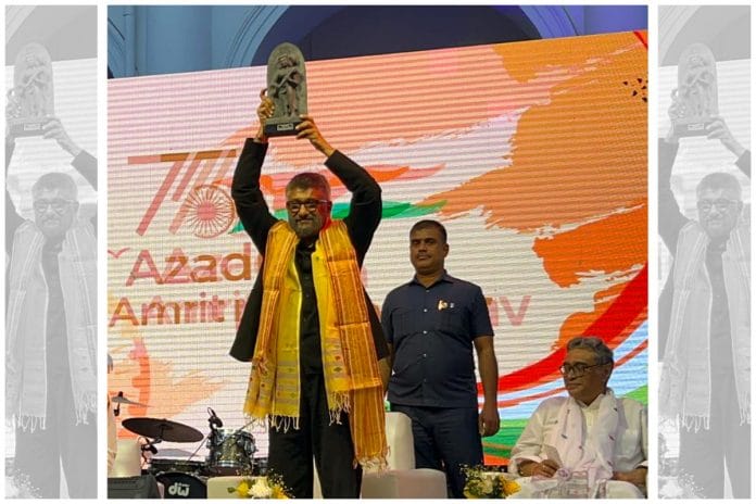 Filmmaker Vivek Agnihotri at an event in Kolkata on Sunday. Seated next to him is BJP MP Swapan Dasgupta | Twitter | @vivekagnihotri