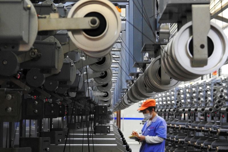 Asia's factory activity weakens as global demand falters
